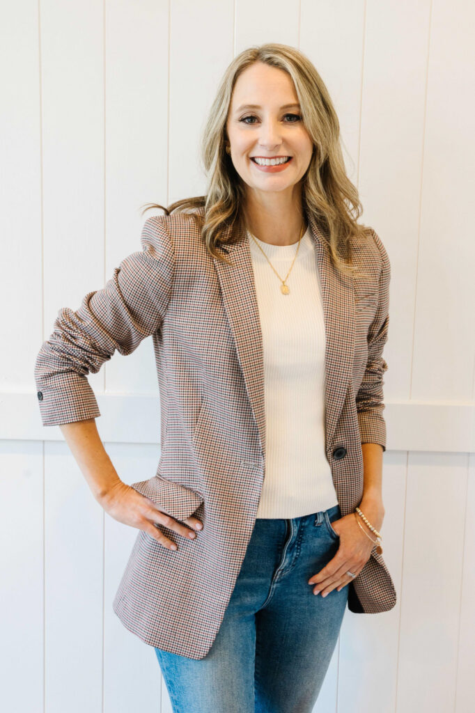 Headshot of a florist in Portland standing with her hand on her hips 